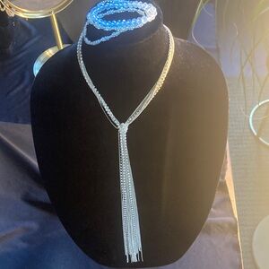 Elegant Silver Necklace with Tassel Design and bracelets